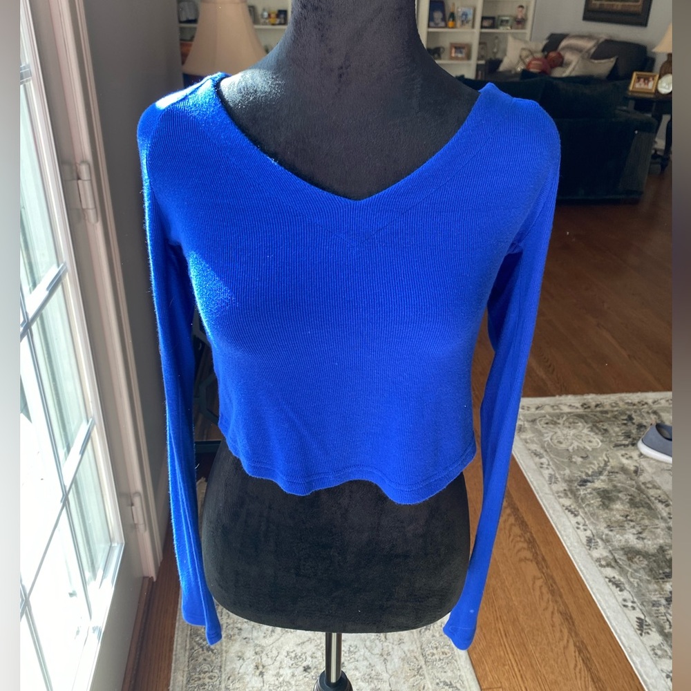 Free people open back tie blouse.